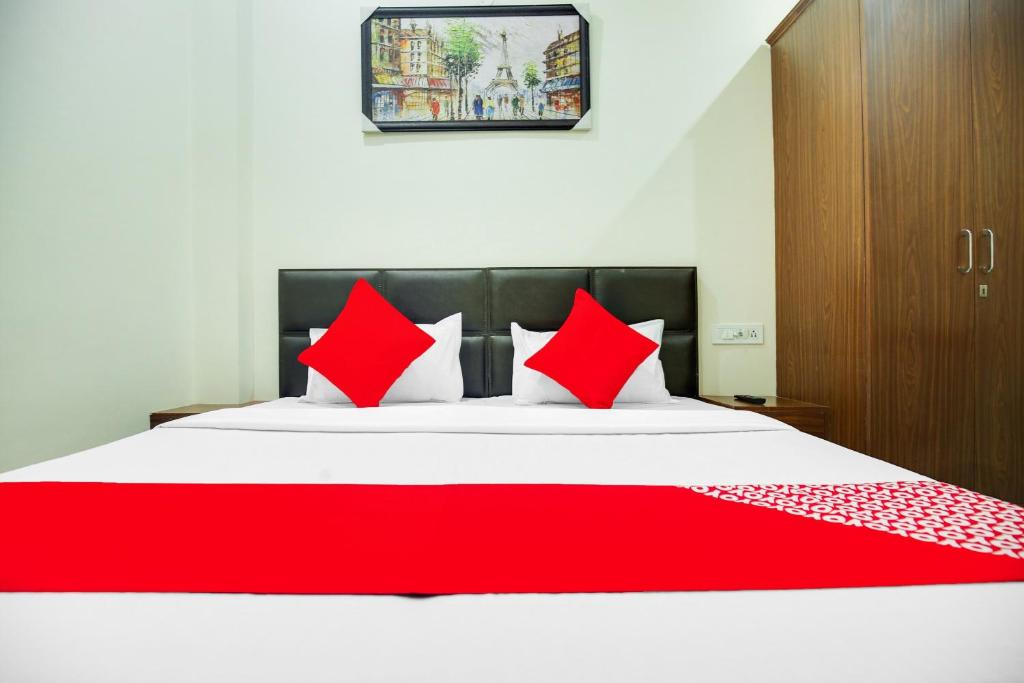 Postel nebo postele na pokoji v ubytování Hotel O Sky Line