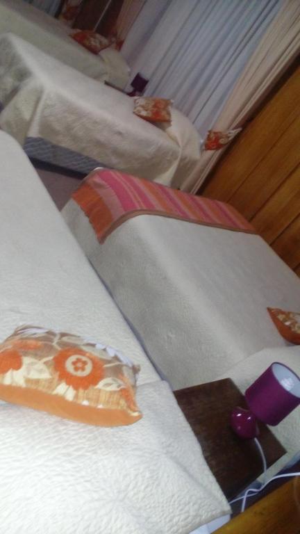 Postel nebo postele na pokoji v ubytování Hotel Le Mirage