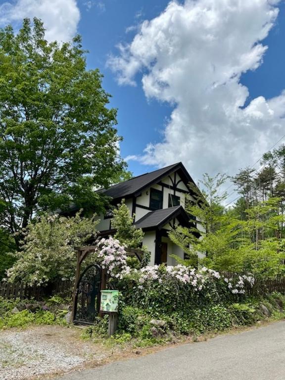 a house on the side of the road at Villa Grace in Hokuto