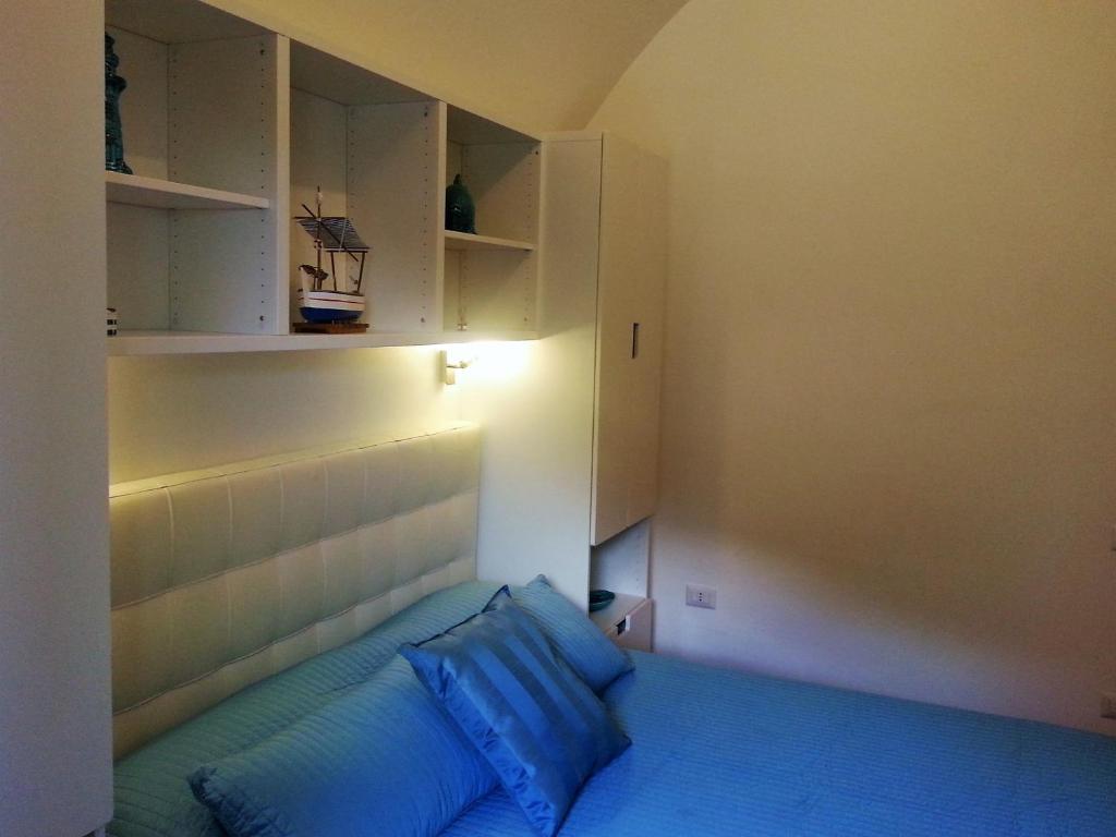 Кровать или кровати в номере Casa Vacanze Bouganvillea