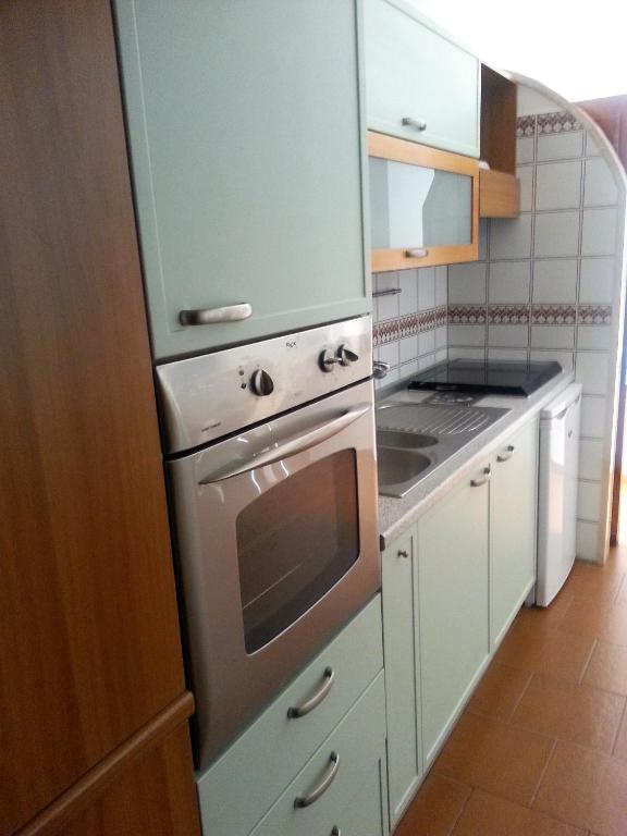 Кухня или мини-кухня в Casa Vacanze Bouganvillea
