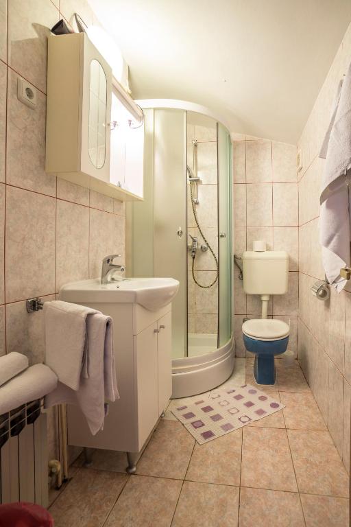 Koupelna v ubytování Villa Amigo