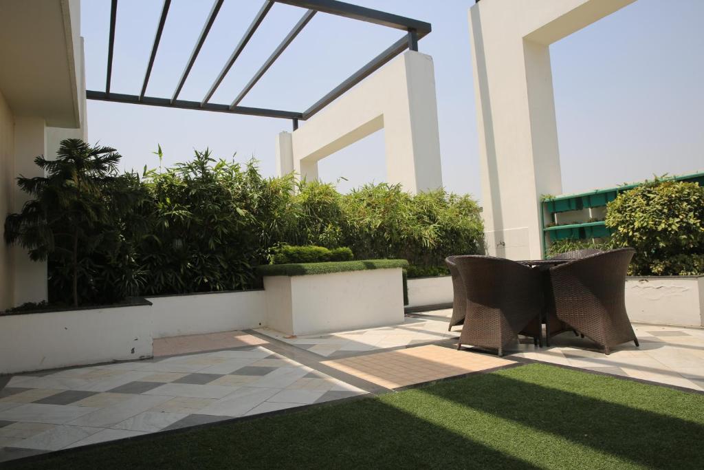 Zahrada ubytování Ramada by Wyndham Ghaziabad Vasundhara