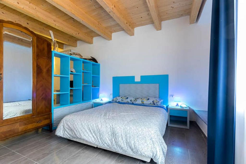 Postel nebo postele na pokoji v ubytování Residenza Cuntin