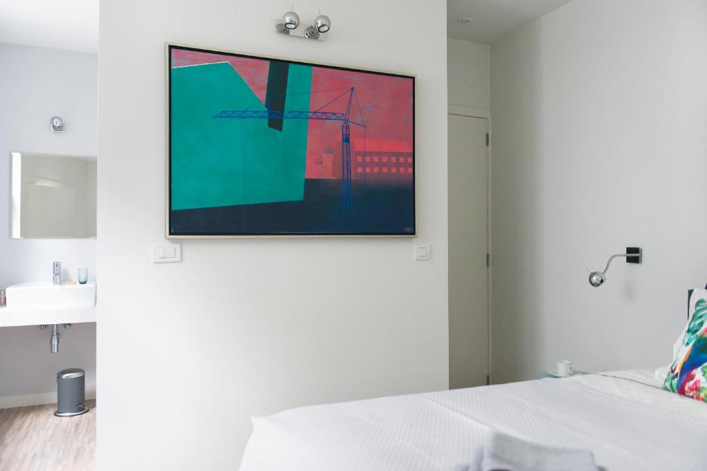 Voodi või voodid majutusasutuse 4B B&B Brugge toas