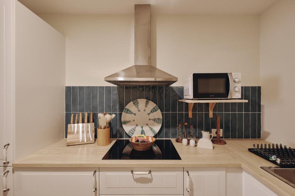 Køkken eller tekøkken på Apartamentos Atlantis