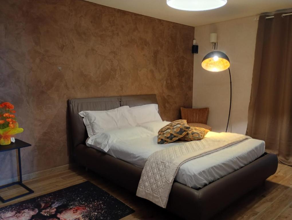 Giường trong phòng chung tại Villa il Poggio