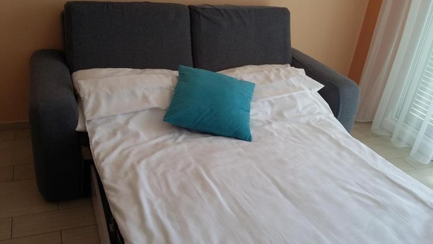 Posteľ alebo postele v izbe v ubytovaní Apartments Ines