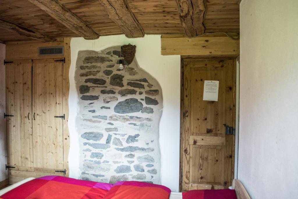 Postel nebo postele na pokoji v ubytování Rifugio Serot