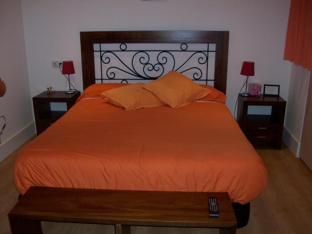 Cama o camas de una habitación en Hostal Rural Arrobi Borda