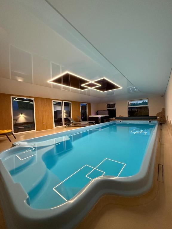 Piscina a Willa Ariadna o a prop