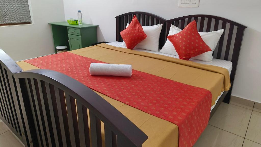 Postel nebo postele na pokoji v ubytování Ashirvad Homes