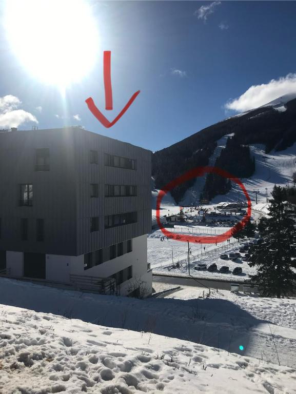 a view of a ski resort in the snow at Apartment Starlight Bjelašnica in Bjelašnica