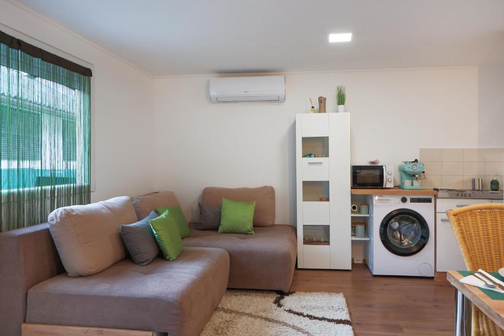Posezení v ubytování Gunaras Apartman RT