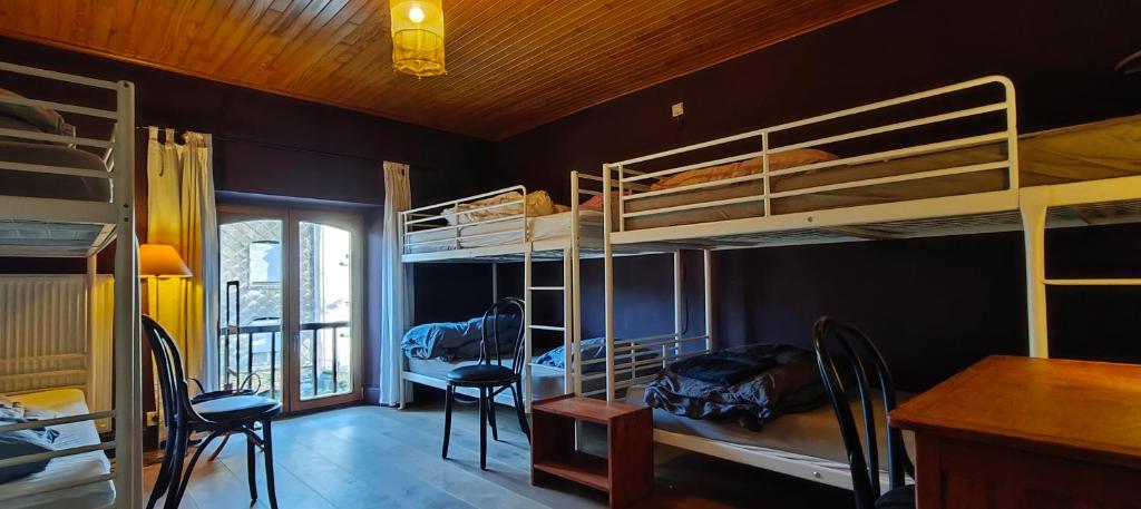 Postel nebo postele na pokoji v ubytování L'Eaubergerine