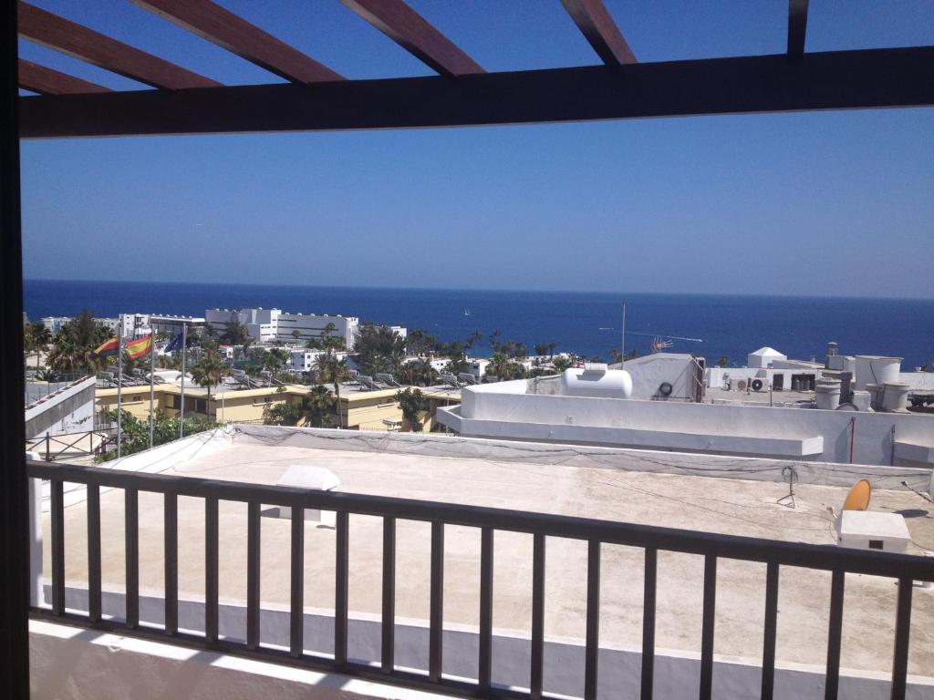 a view of the ocean from a balcony at Gabiete in Puerto del Carmen