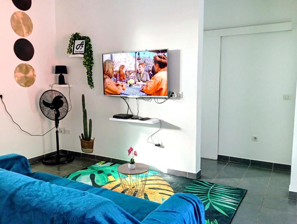TV a/nebo společenská místnost v ubytování Hello Appart sur Rémire-Montjoly