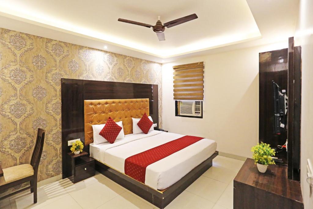 Voodi või voodid majutusasutuse P S Grand By Iconic Near Delhi International Airport toas