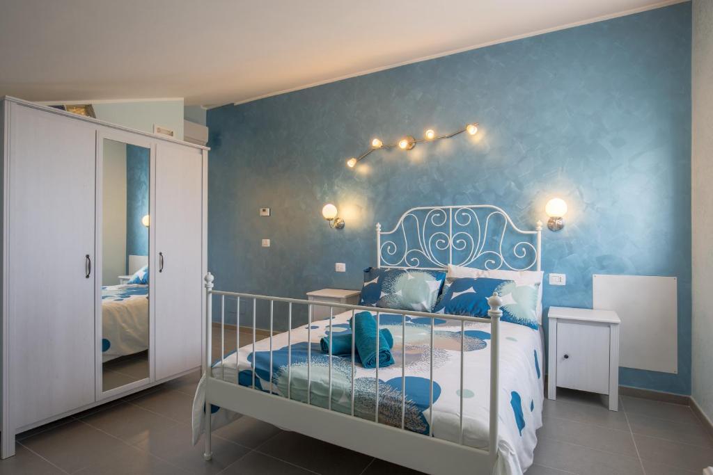Postel nebo postele na pokoji v ubytování BellaVista B&B