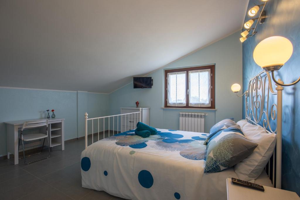 Postel nebo postele na pokoji v ubytování BellaVista B&B