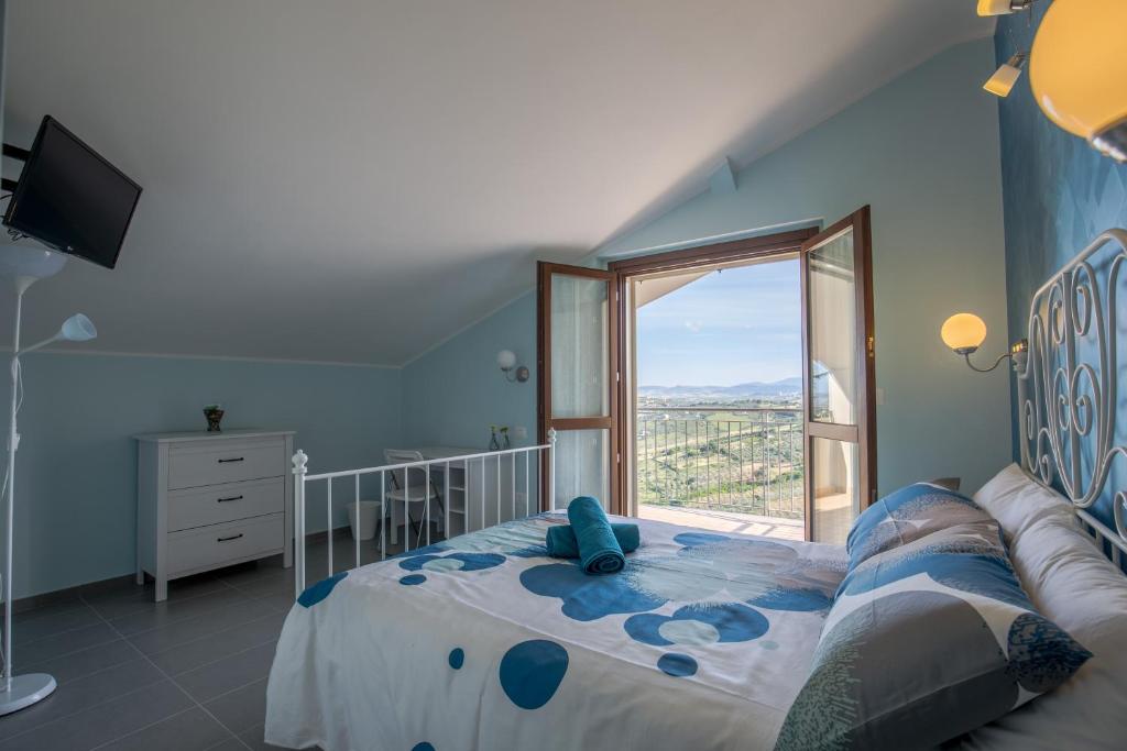 Postel nebo postele na pokoji v ubytování BellaVista B&B