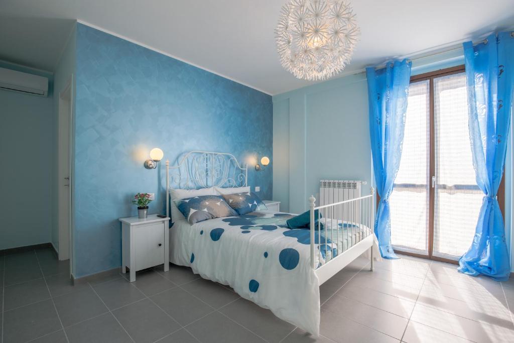 Postel nebo postele na pokoji v ubytování BellaVista B&B