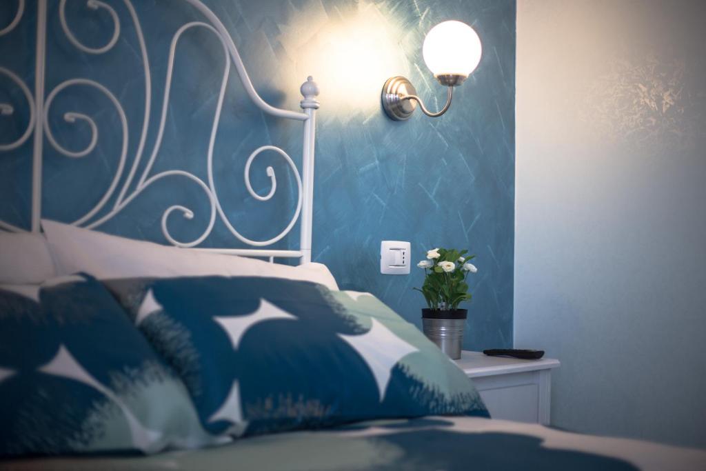 Postel nebo postele na pokoji v ubytování BellaVista B&B