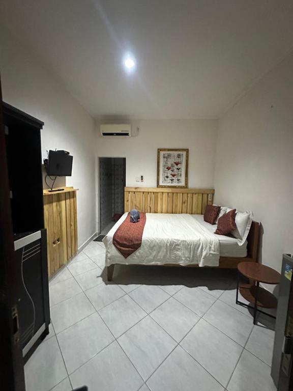 Postel nebo postele na pokoji v ubytování Sari Buana Bed & Breakfast