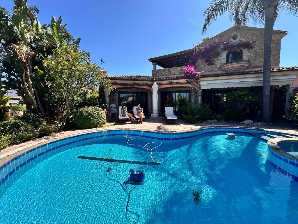 Photo de la galerie de l'établissement Villa Fenicotteri with private Pool in San Teodoro, à San Teodoro