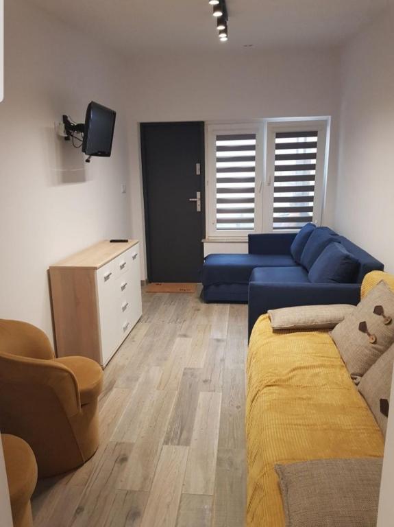 Posezení v ubytování Apartament w centrum Okuninki
