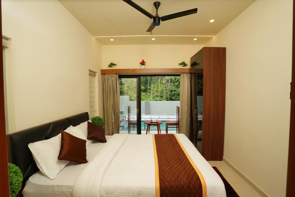 Postel nebo postele na pokoji v ubytování LA VILLA Resort