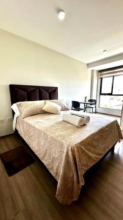 Lova arba lovos apgyvendinimo įstaigoje Suite downtown