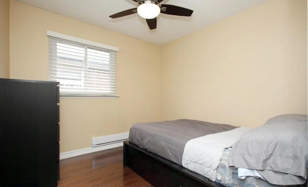 Ένα ή περισσότερα κρεβάτια σε δωμάτιο στο Chapman H