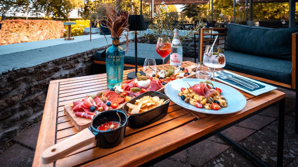 a table full of food on a table at Hotel Tihany Átrium in Tihany