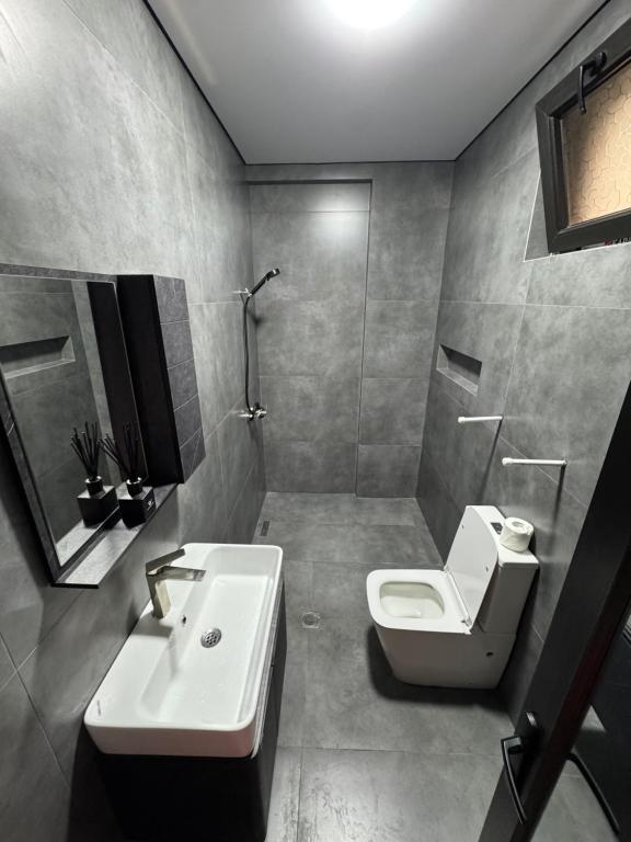 Koupelna v ubytování Ninoshvili str Apartments