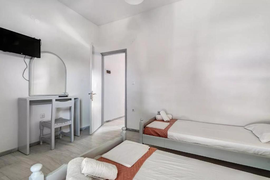 En eller flere senge i et værelse på Royal Apartments