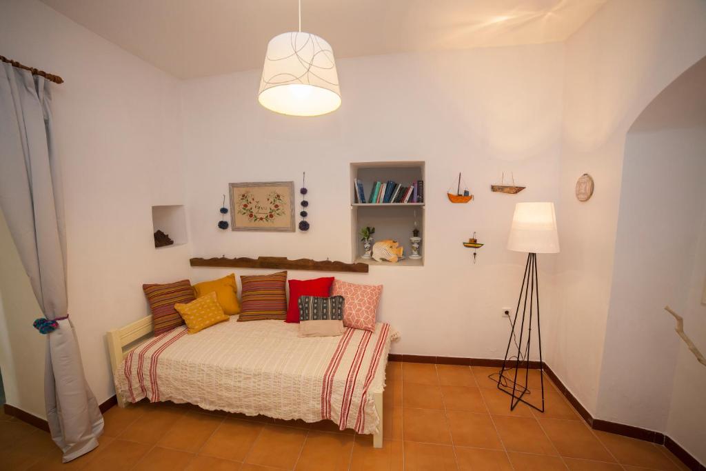 Postel nebo postele na pokoji v ubytování Family Home PortoKatapola