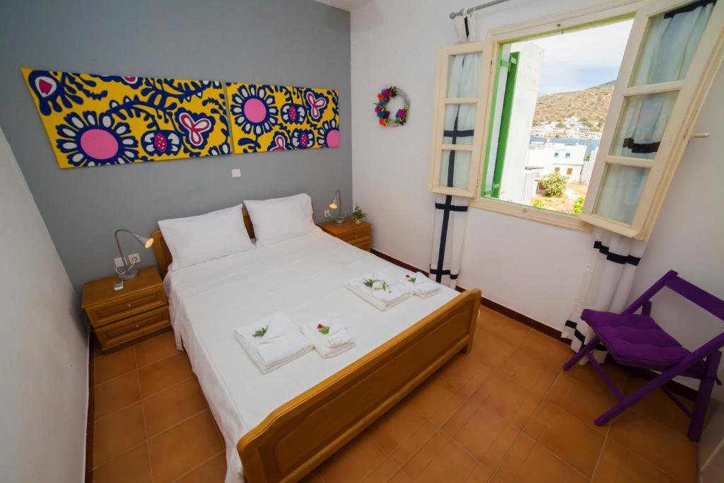 Postel nebo postele na pokoji v ubytování Family Home PortoKatapola