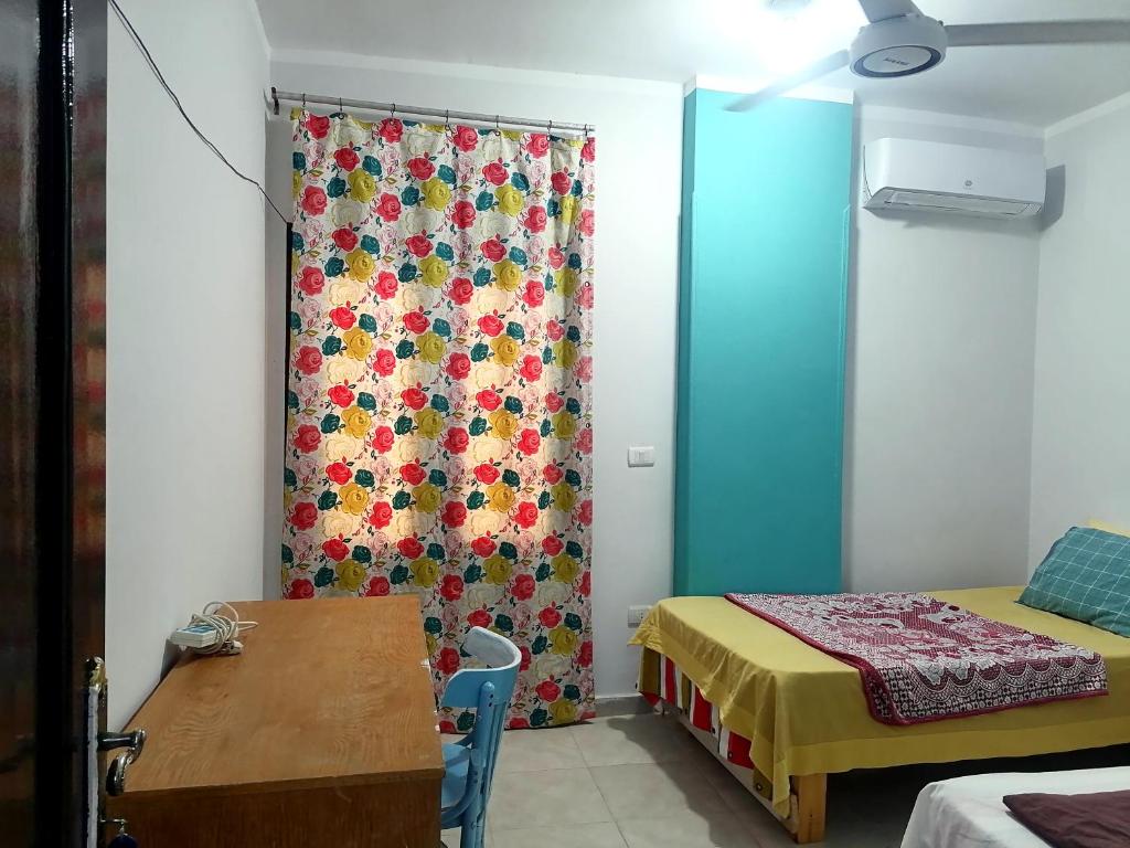 Ένα ή περισσότερα κρεβάτια σε δωμάτιο στο cozy room 2 Hurgada a room in apartment