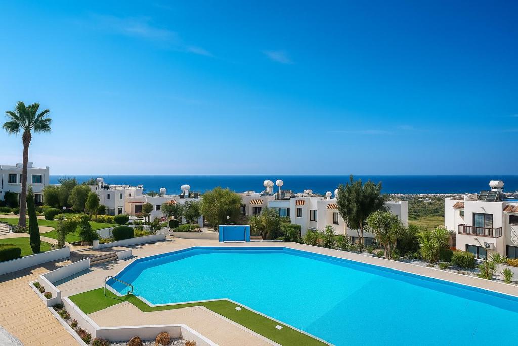 Πισίνα στο ή κοντά στο SeaView Luxury Apartment Chloraka Paphos, Pool, Smart TV 65 Inch