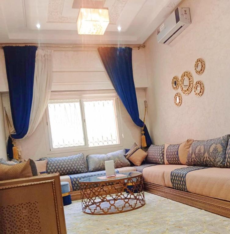 Posezení v ubytování Appartement Marrakech à 10 minutes de l'aéroport