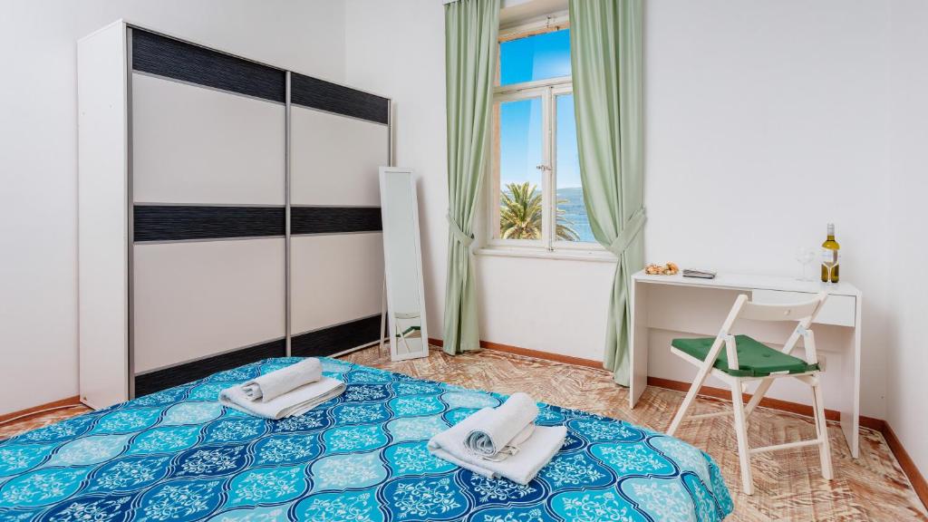 Postel nebo postele na pokoji v ubytování Riva Guesthouse