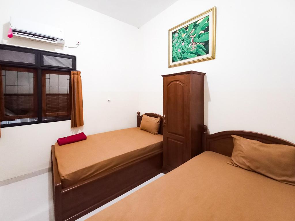 Wisma Trubus Syariah RedPartner Near RSUD Koesma Tuban - Habitación Doble Estándar