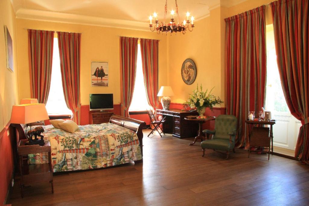 Postel nebo postele na pokoji v ubytování Hotel Château Bela