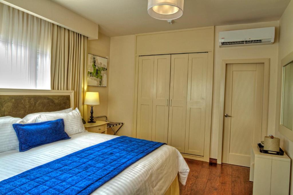 Postel nebo postele na pokoji v ubytování Isabella Boutique Hotel