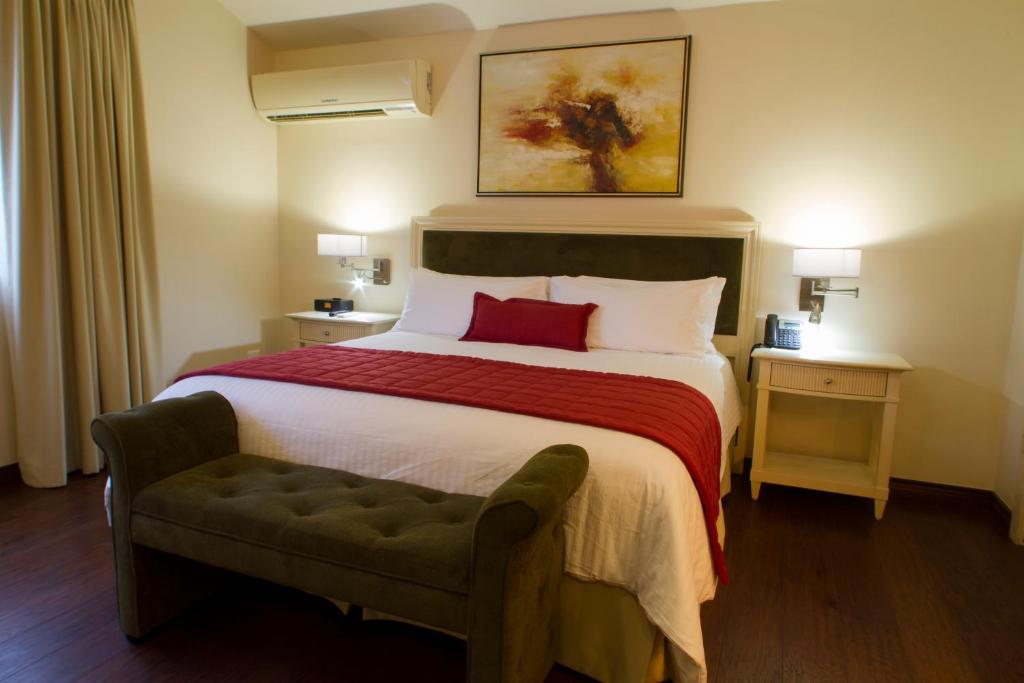 Postel nebo postele na pokoji v ubytování Isabella Boutique Hotel