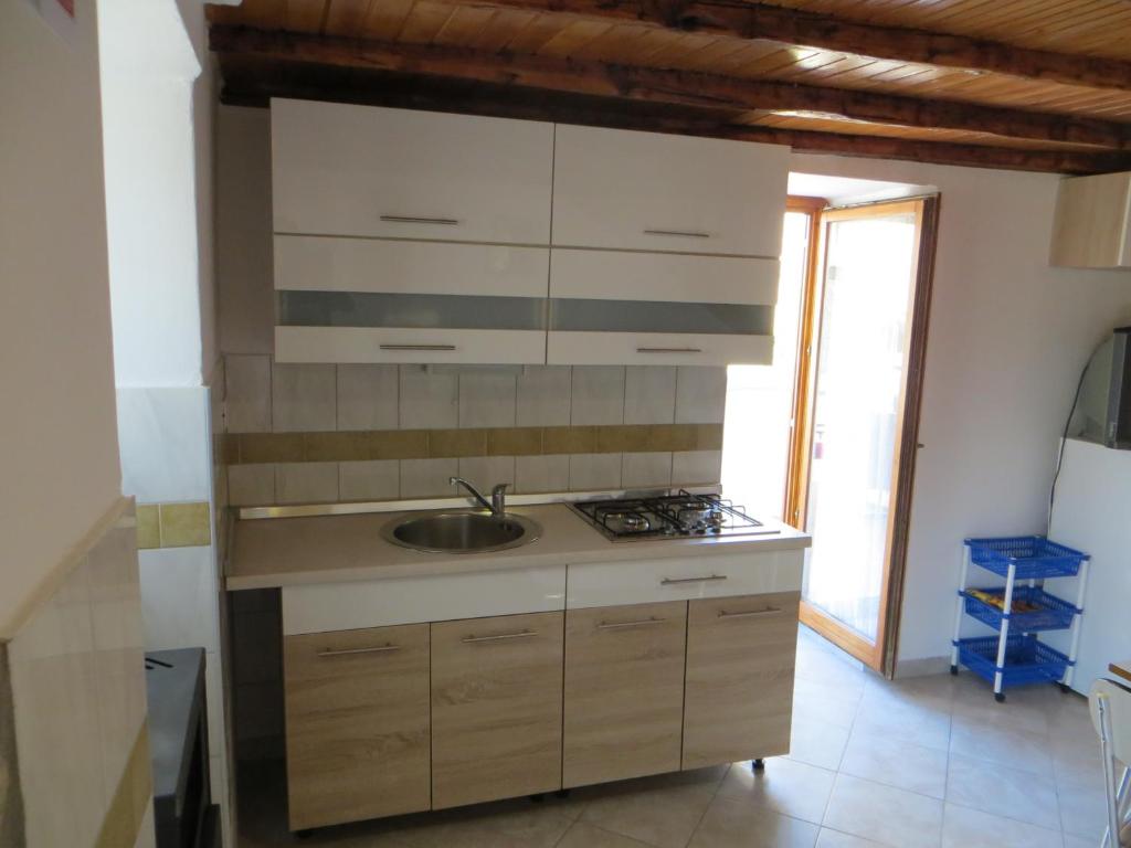 Kuchyň nebo kuchyňský kout v ubytování Holiday Home Pernat