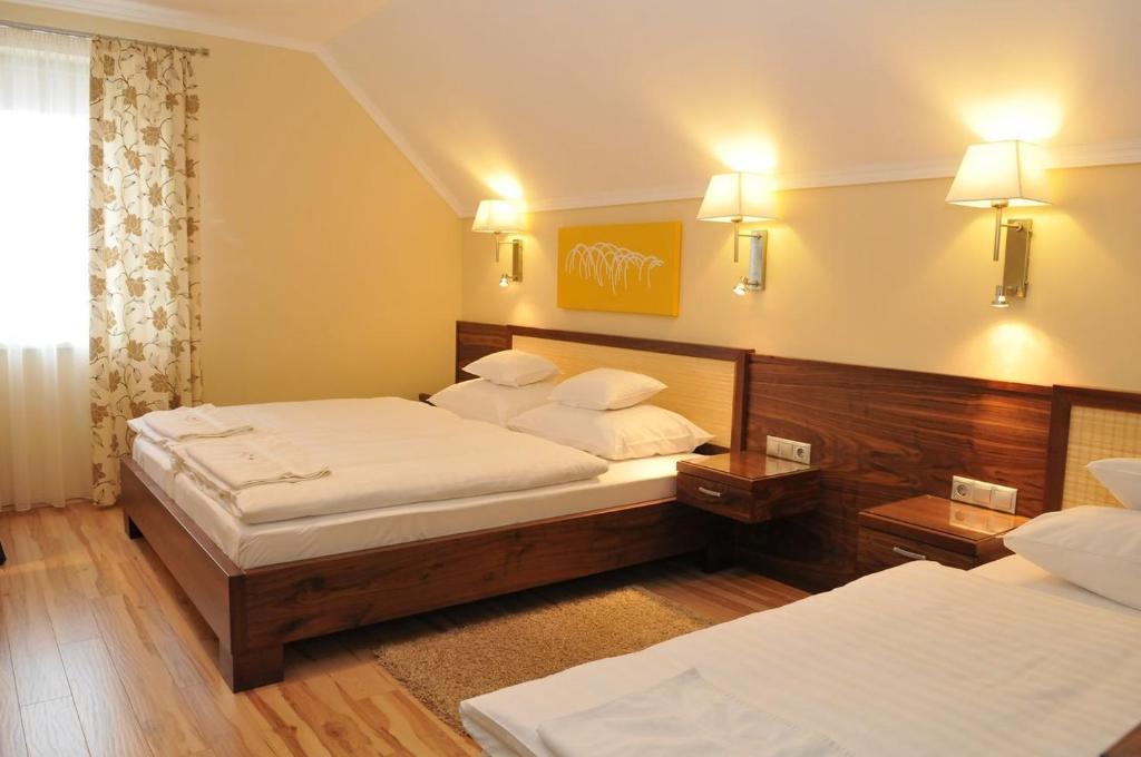 Postel nebo postele na pokoji v ubytování Mizse Motel