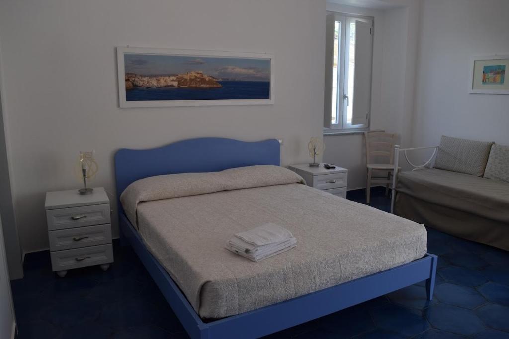 Postel nebo postele na pokoji v ubytování La Casa di Cirro