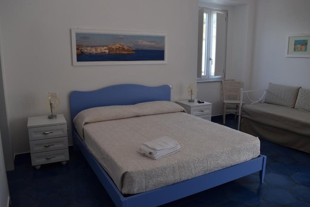 Posteľ alebo postele v izbe v ubytovaní La Casa di Cirro